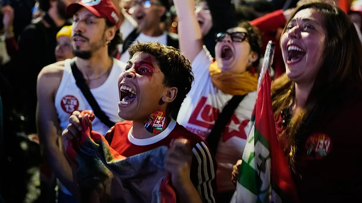 Image accompanying reporting about Brazil: Thousands flood streets to celebrate Lula's election victory