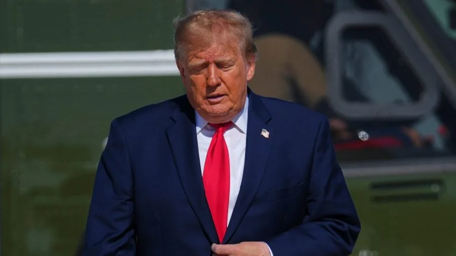 Image accompanying reporting about Live updates: Trump heads to Michigan; Blanche defends DOJ’s Alaska lawsuit