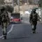 Image accompanying reporting about Israel to close West Bank crossings before elections amid military operation