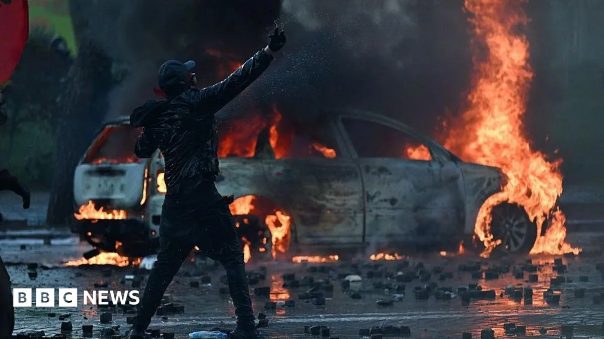 Image accompanying reporting about Anti-government protesters battle with police in Albania