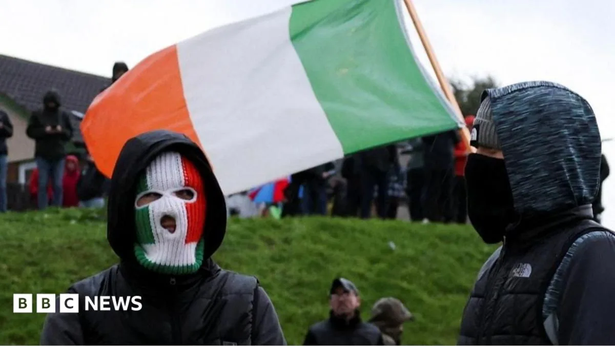 Image accompanying reporting about Orange Order march row goes to heart of ongoing divisions in Northern Ireland